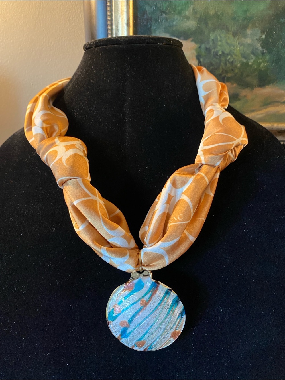 Repurposed glass pendant on a Maeve Anthropologie new scarf.
